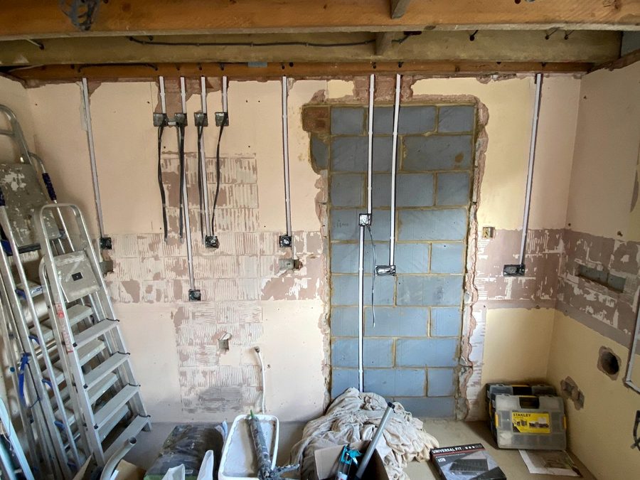 Rewire at first fix, back boxes and cables in place